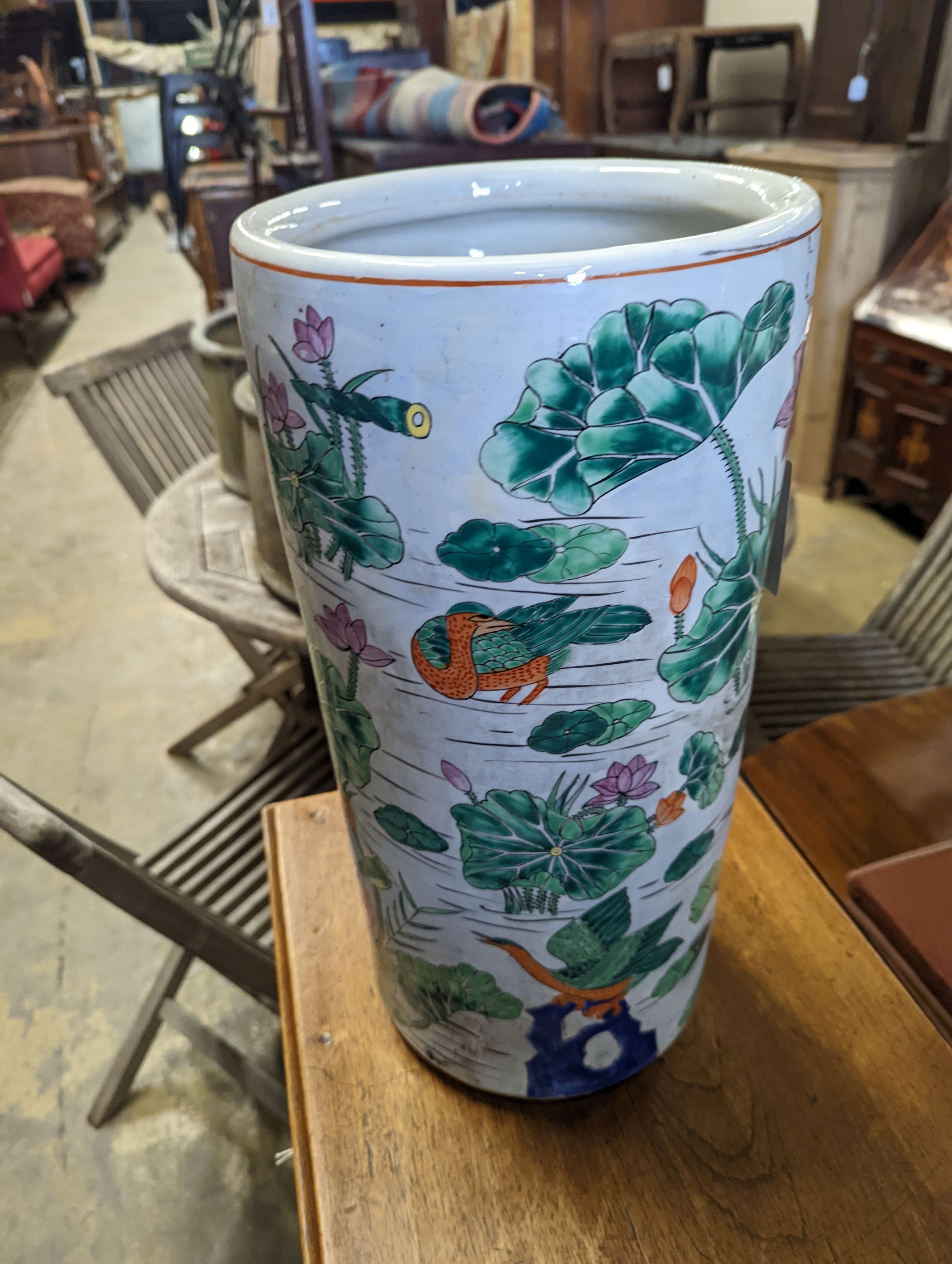 A modern Chinese glazed earthenware stick stand, diameter 23cm, height 46cm